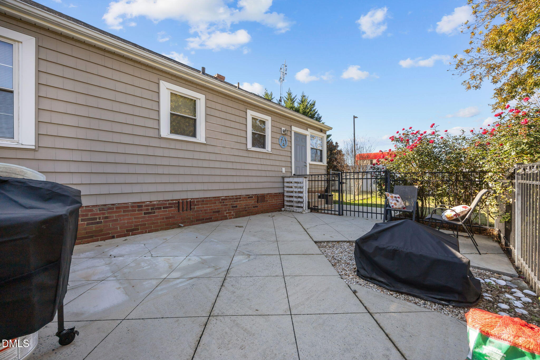128 Moore Street Graham, NC 27253 - Photo 41 of 45 a house view with a outdoor space