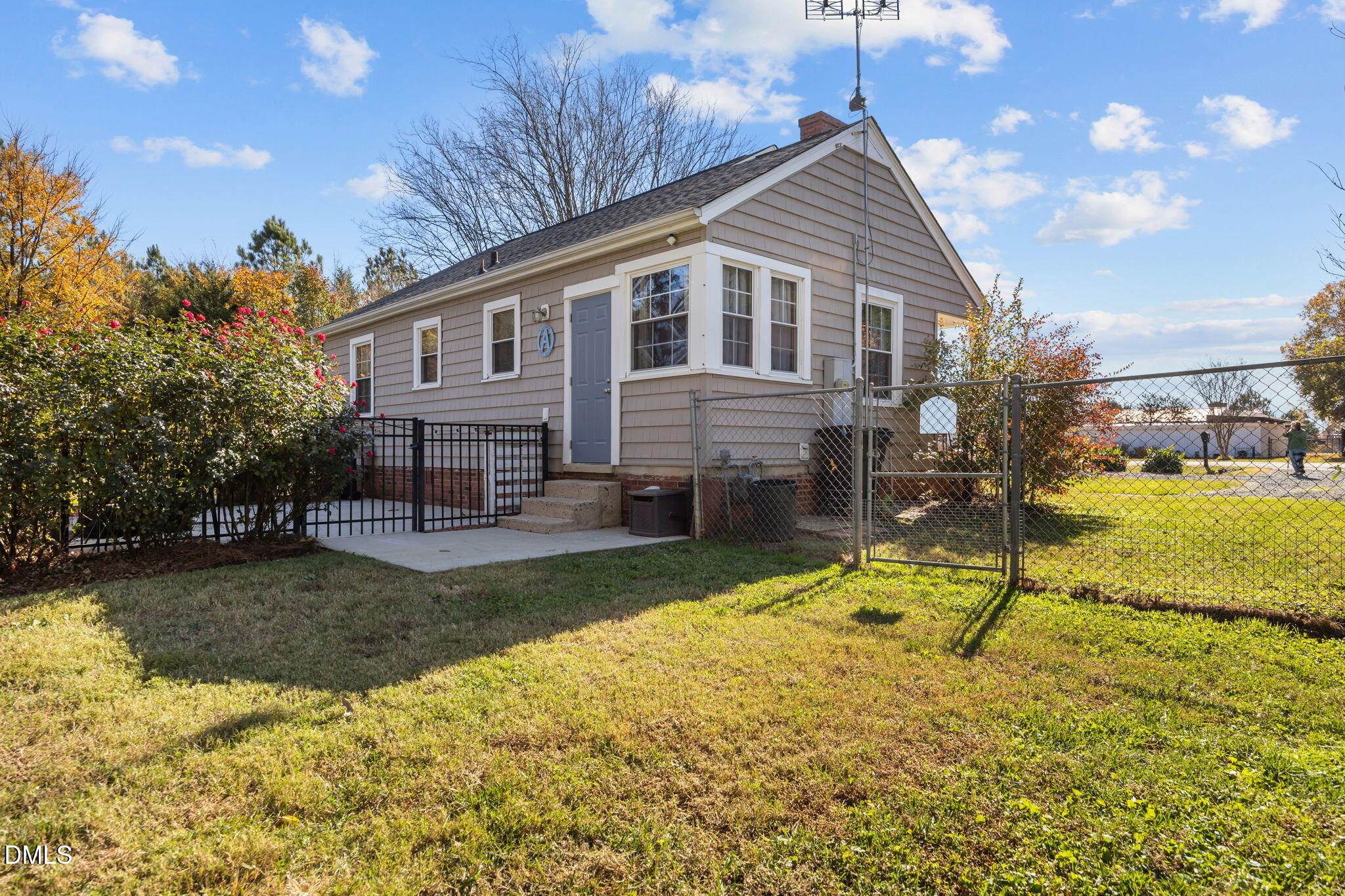128 Moore Street Graham, NC 27253 - Photo 42 of 45 a house view with swimming pool and garden