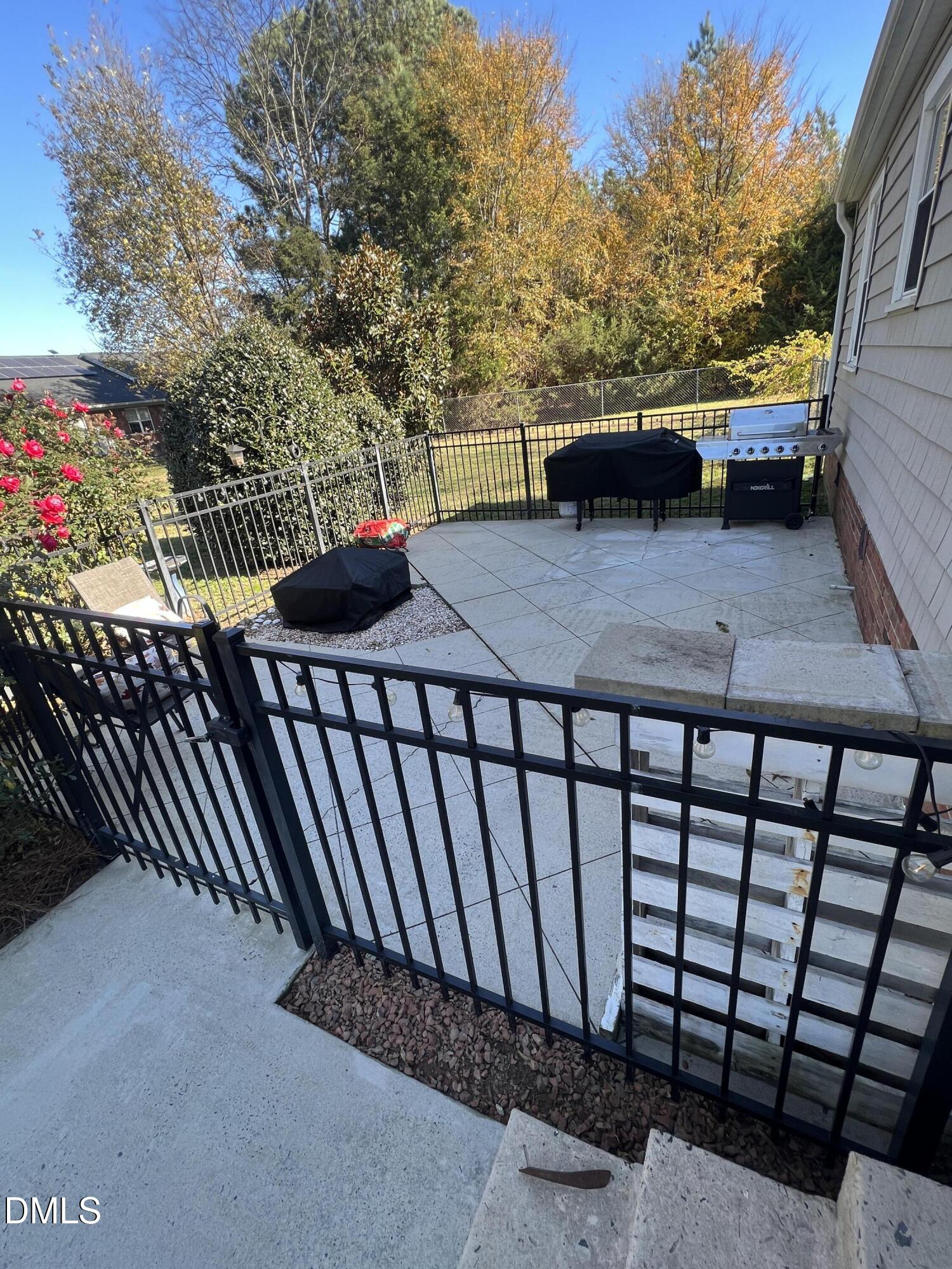 128 Moore Street Graham, NC 27253 - Photo 44 of 45 a view of a balcony with chairs