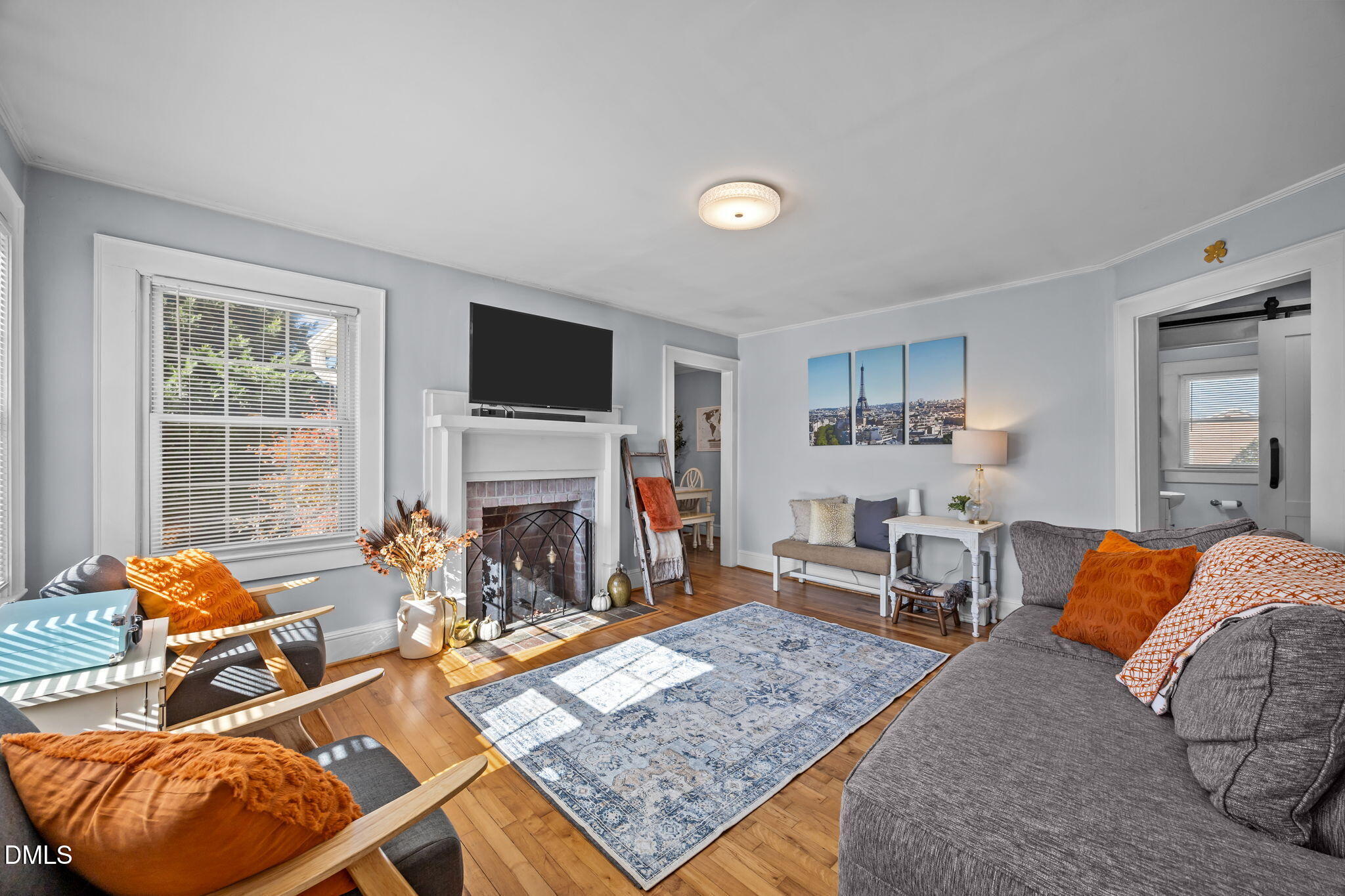 128 Moore Street Graham, NC 27253 - Photo 6 of 45 a living room with furniture and a fireplace