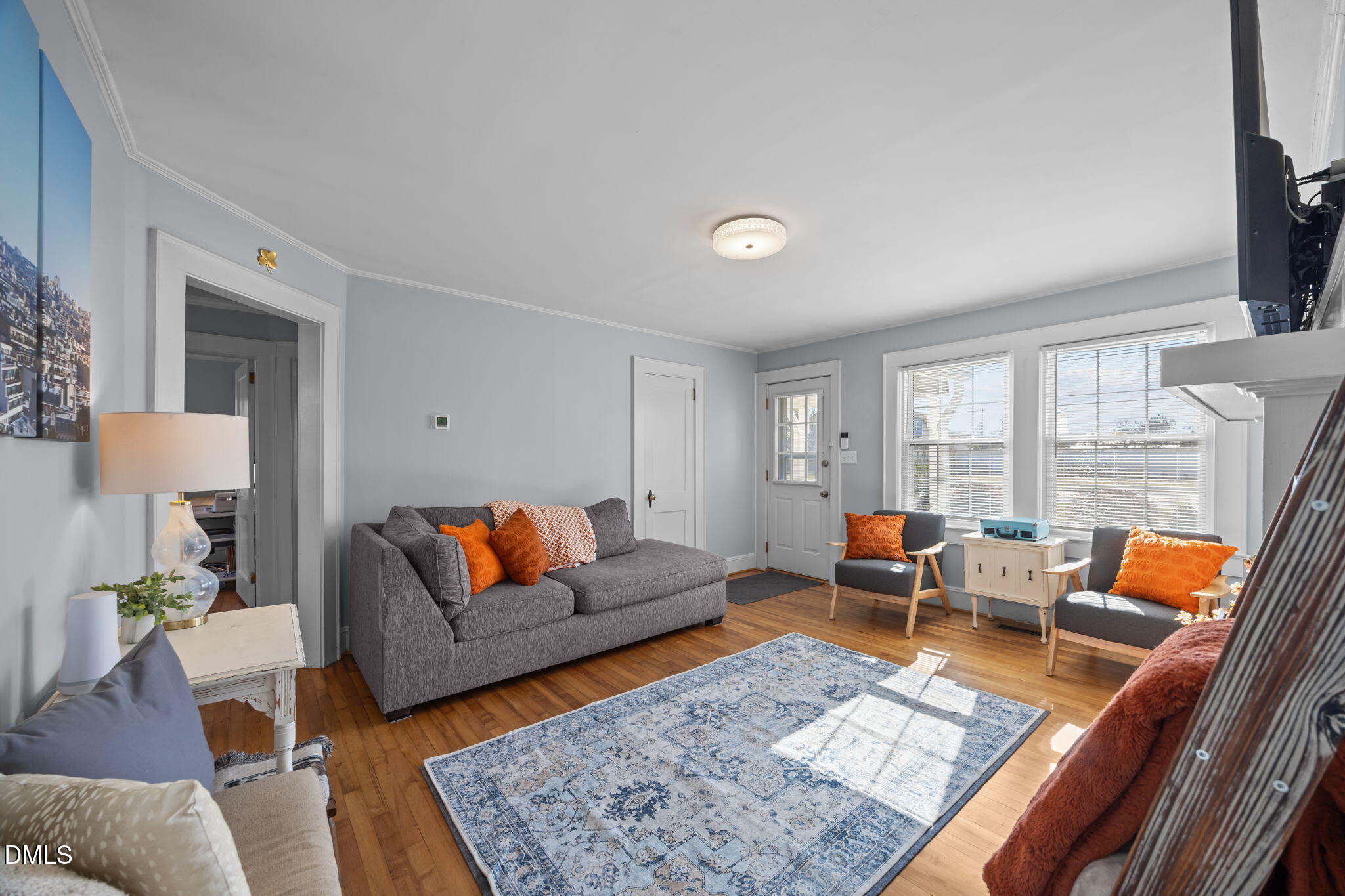 128 Moore Street Graham, NC 27253 - Photo 8 of 45 a living room with furniture and rug
