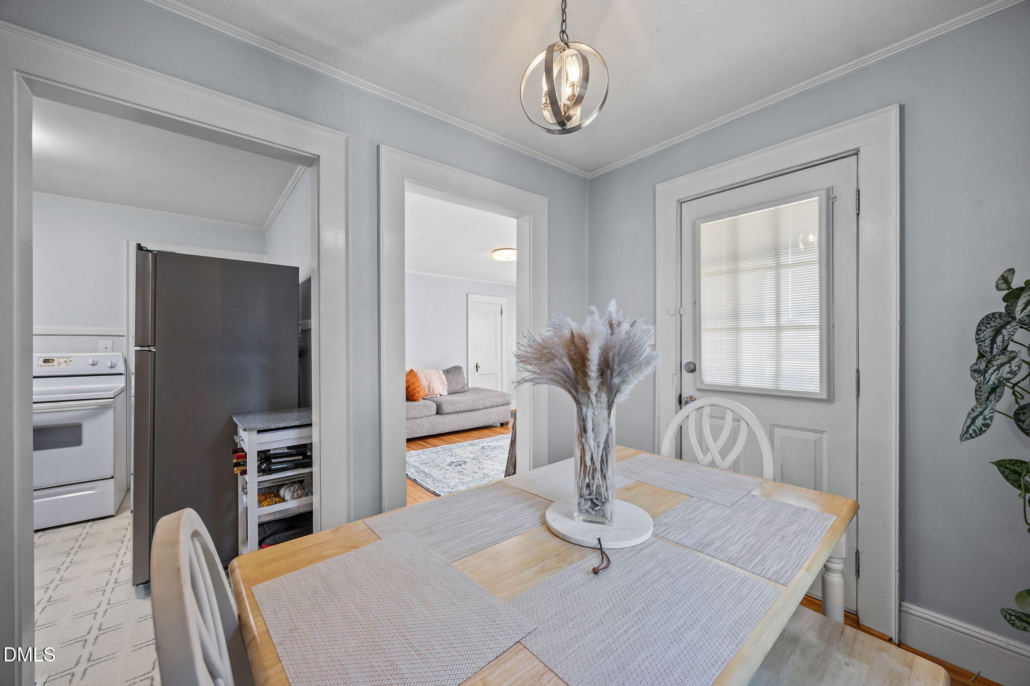 128 Moore Street Graham, NC 27253 - Photo 10 of 45 a view of a dining room with furniture