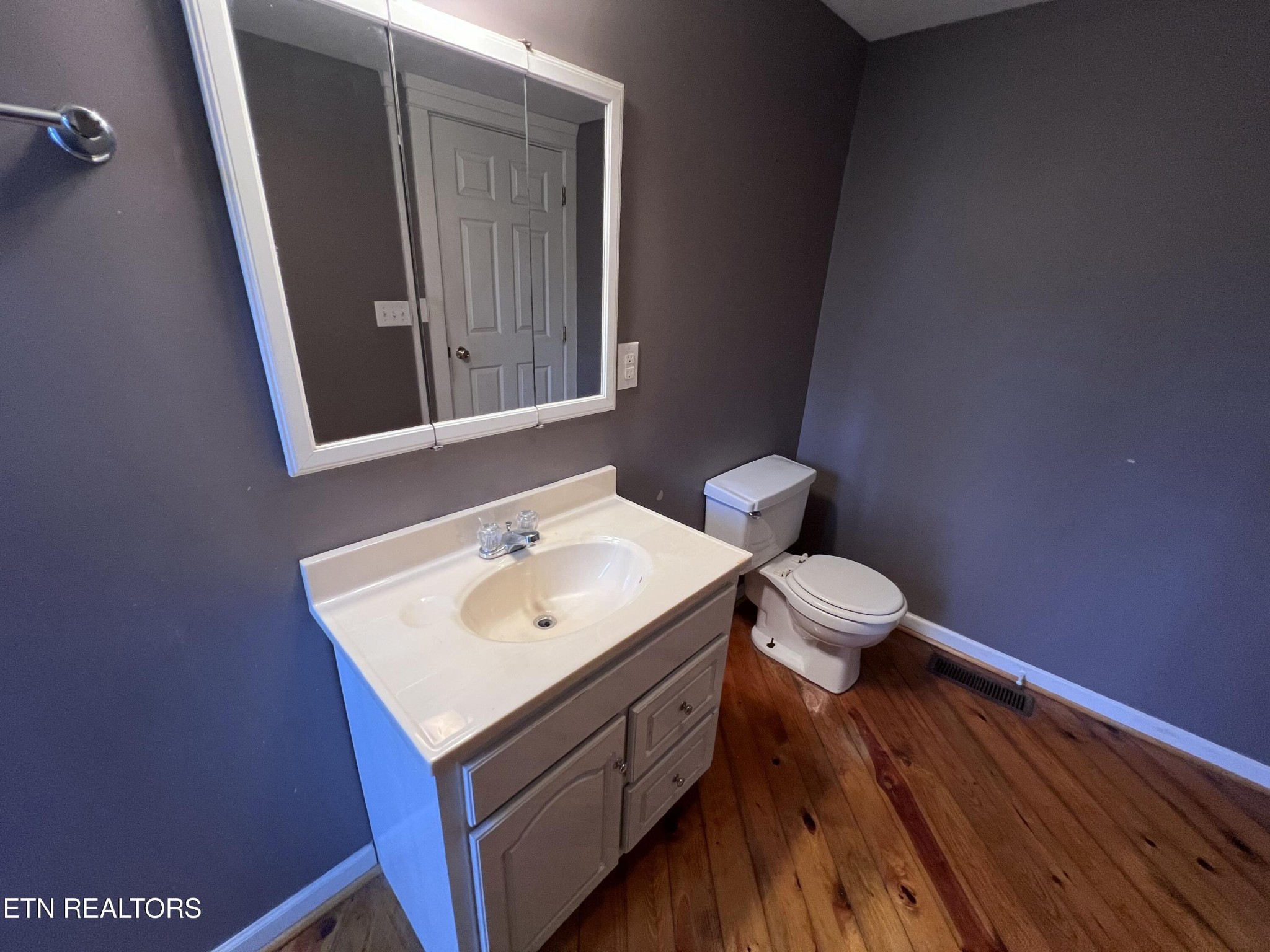 1028 Kennedy Road Jamestown, TN 38556 - Photo 40 of 51 a bathroom with a sink and a mirror