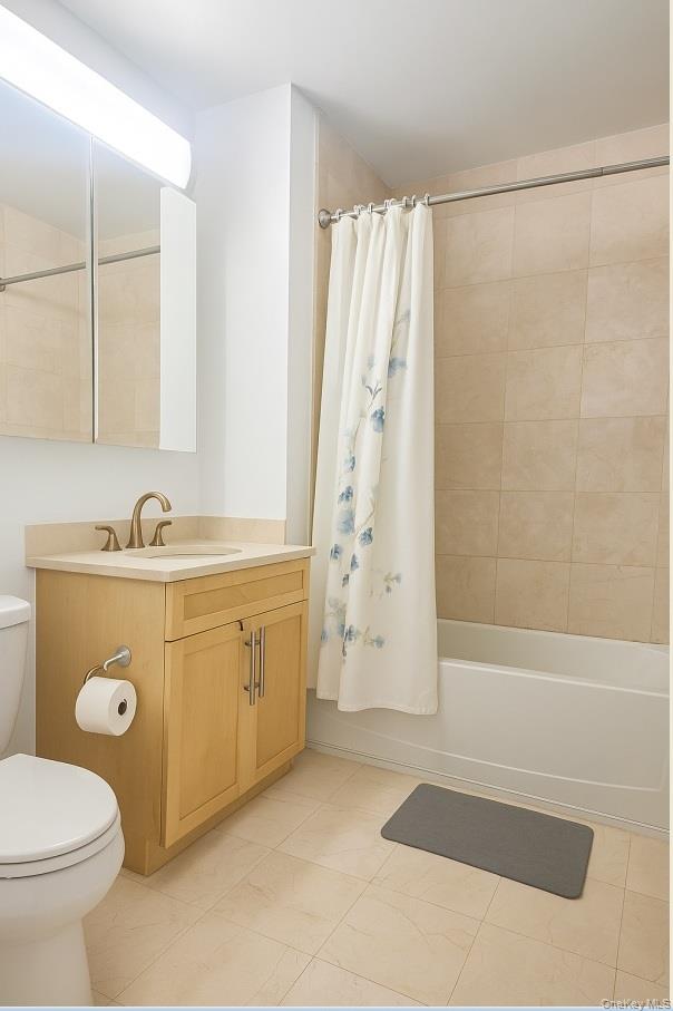 40-22 College Point Boulevard, Unit PH2K Queens, NY 11354 - Photo 8 of 14 a bathroom with a sink toilet and shower