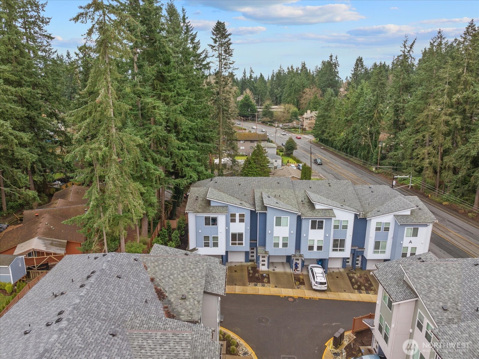 23413 Edmonds Way, Unit A2 Edmonds, WA 98026 - Photo 37 of 40 a aerial view of a house with swimming pool in front of it