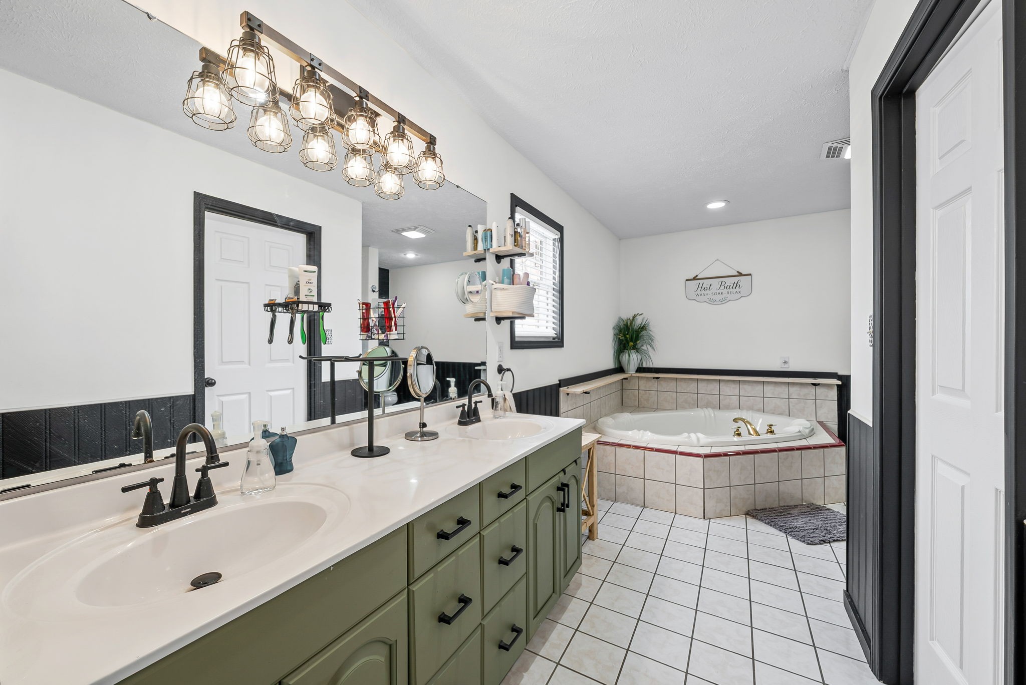 126 Flowers Road Crofton, KY 42217 - Photo 15 of 34 a bathroom with a sink double vanity and a mirror