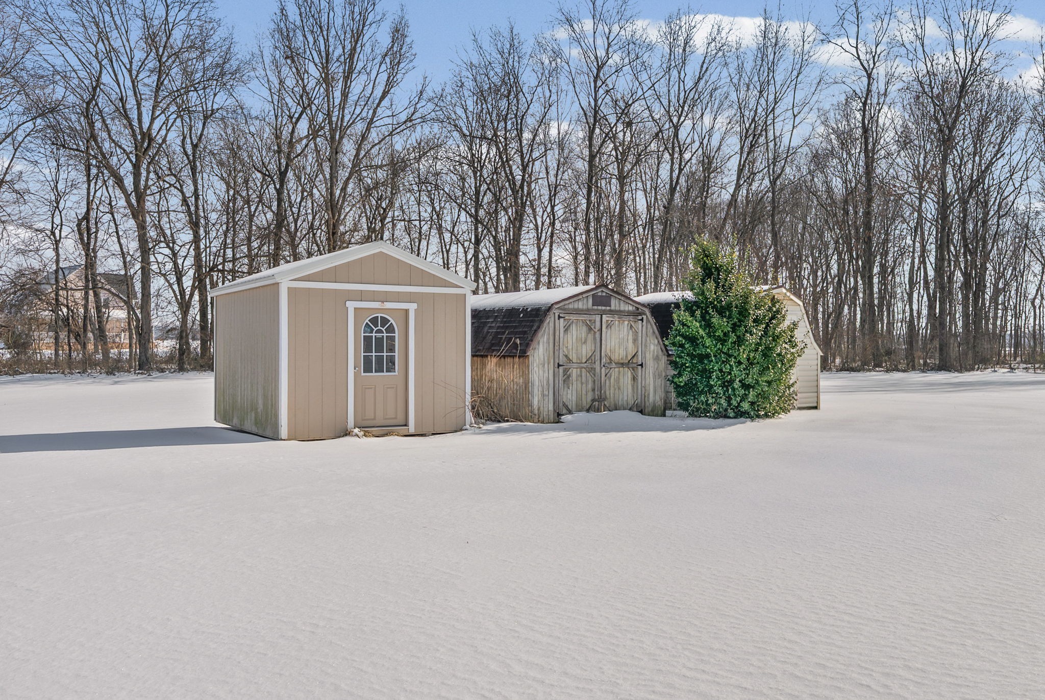 126 Flowers Road Crofton, KY 42217 - Photo 28 of 41 a front view of a house with a garden