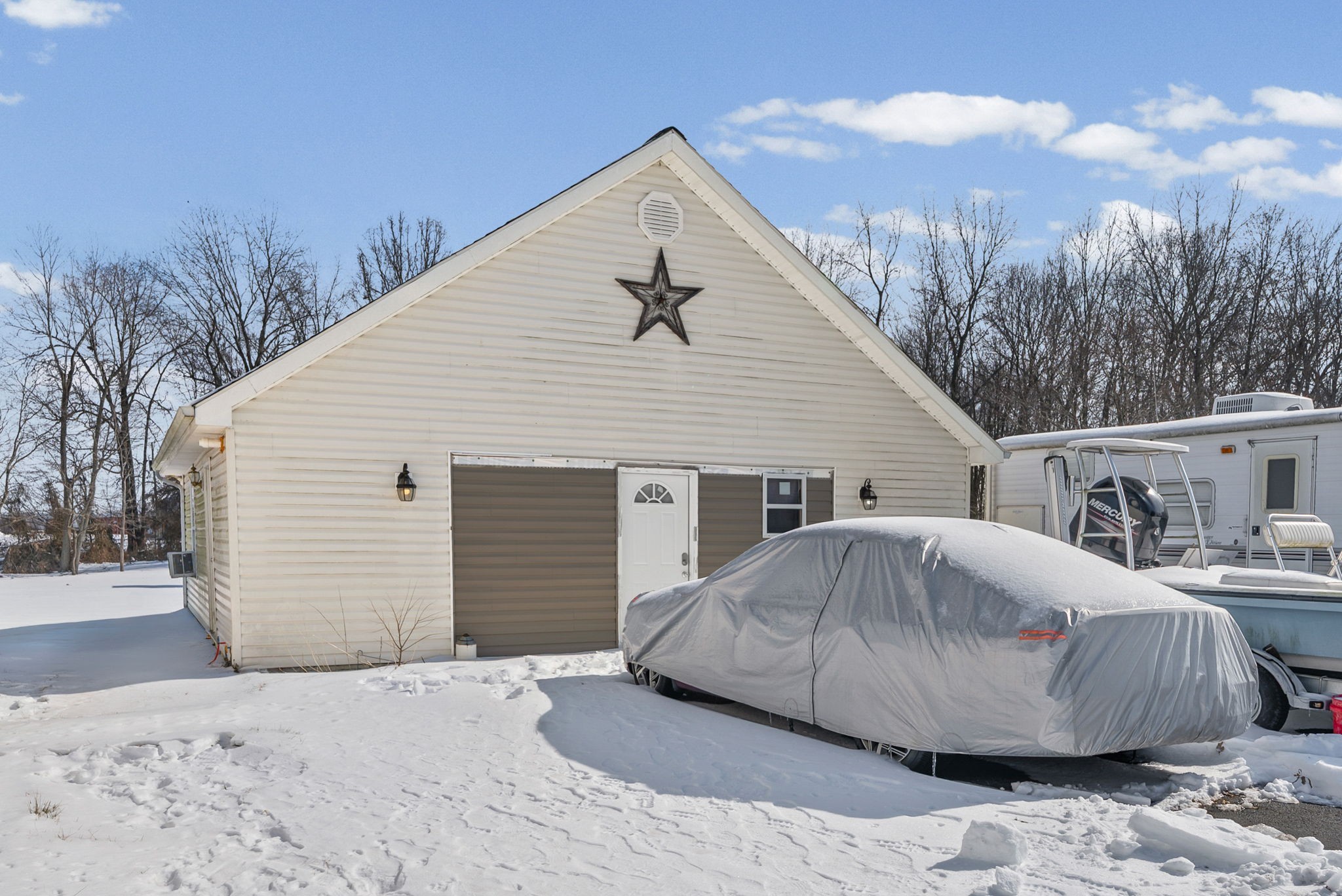 126 Flowers Road Crofton, KY 42217 - Photo 32 of 41 a view of a house with a yard and covered with snow in the background