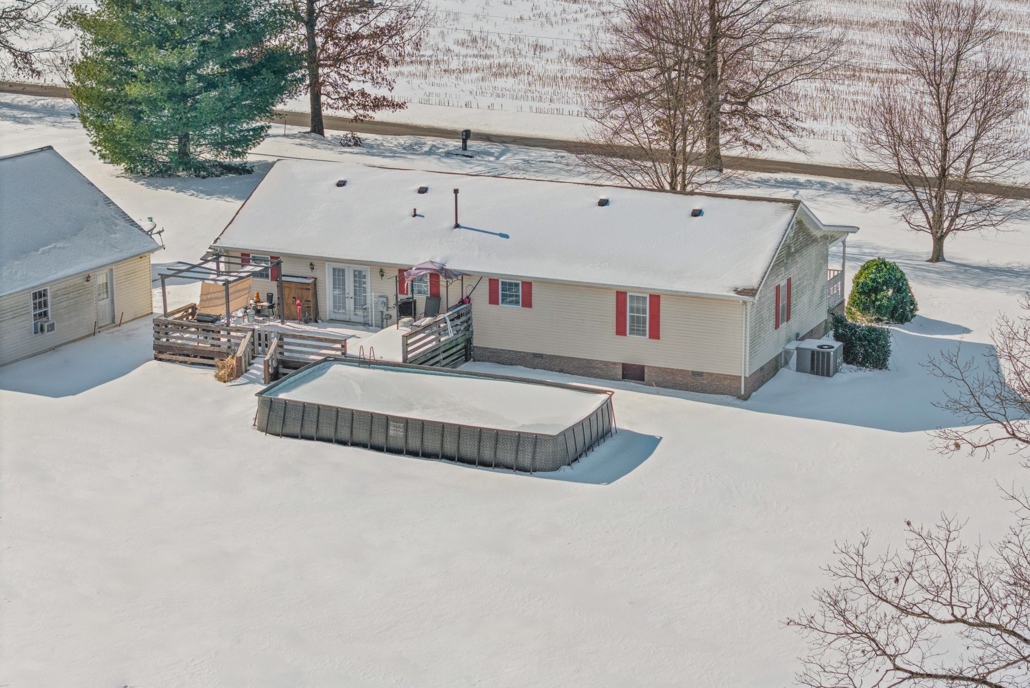 126 Flowers Road Crofton, KY 42217 - Photo 39 of 41 a view of a house with outdoor and sitting area