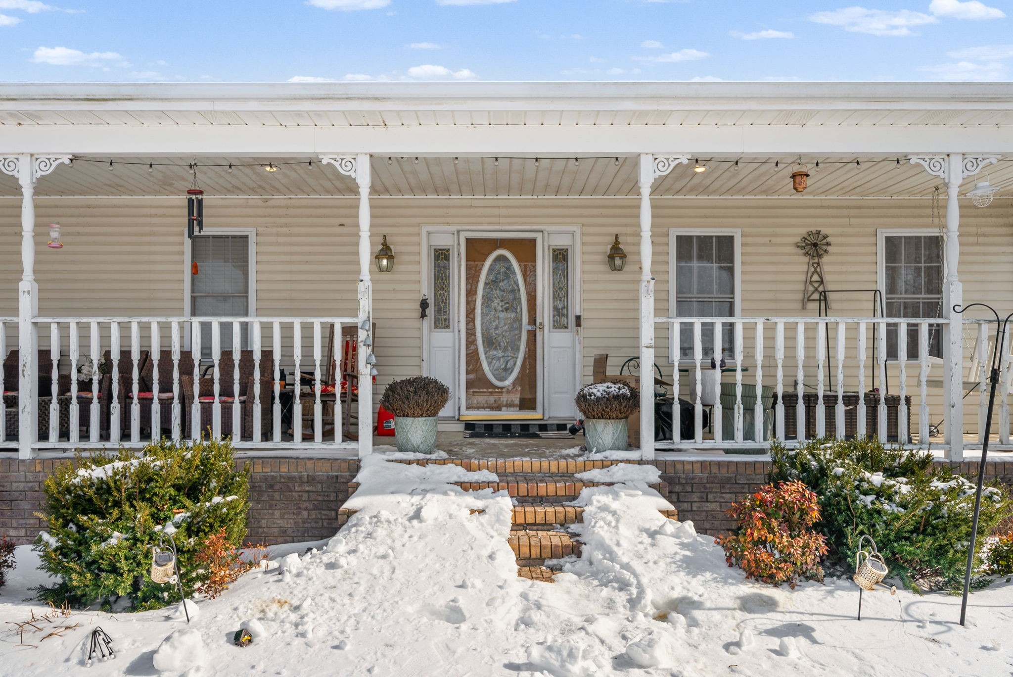 126 Flowers Road Crofton, KY 42217 - Photo 7 of 41 a front view of a house with a garden