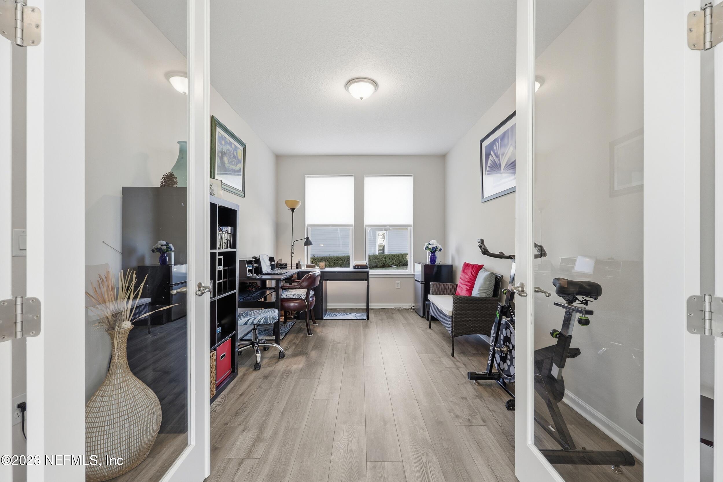 996 Rustic Mill Drive St. Augustine, FL 32092 - Photo 14 of 53 a view of a room with gym equipment