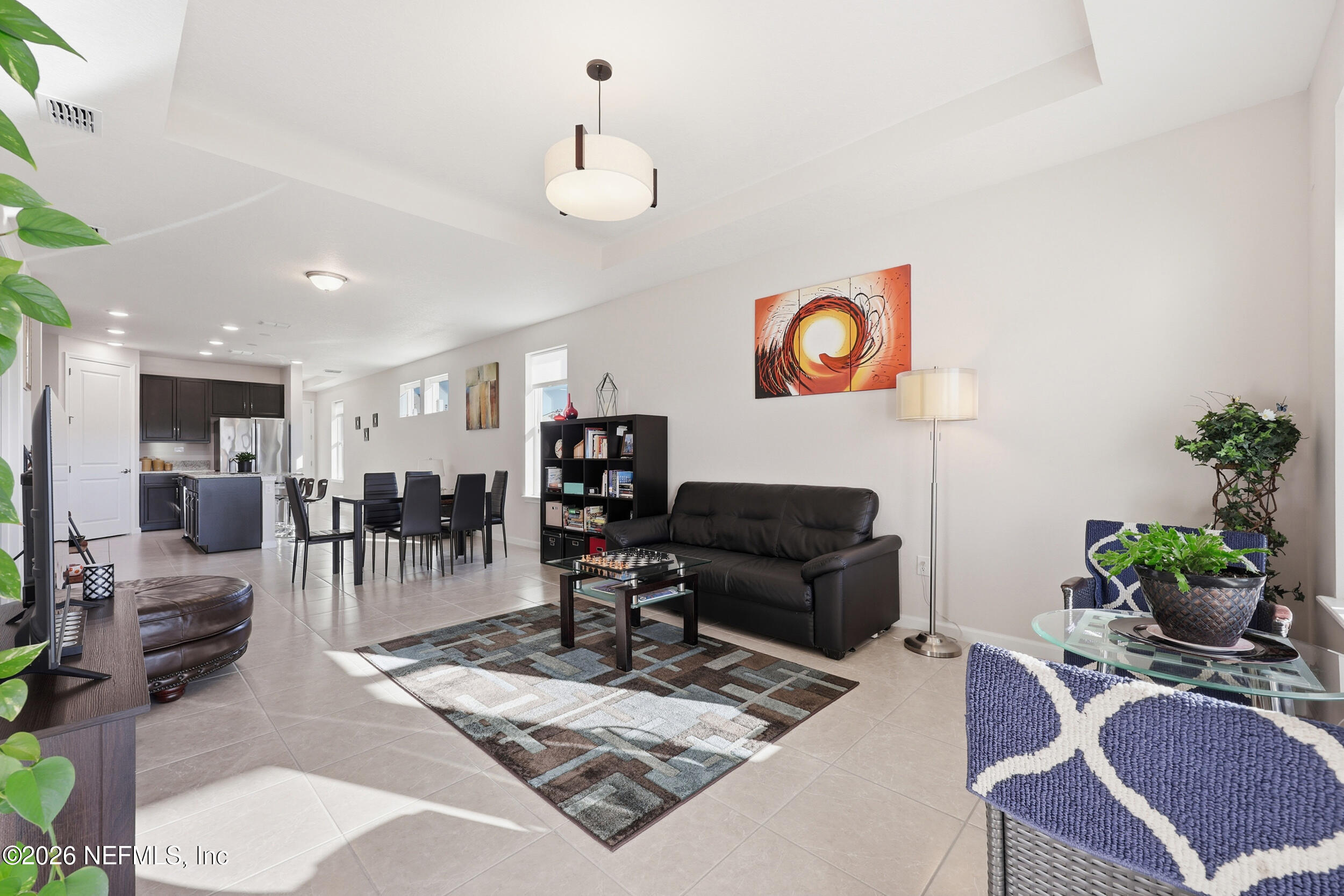 996 Rustic Mill Drive St. Augustine, FL 32092 - Photo 17 of 53 a living room with furniture and kitchen view