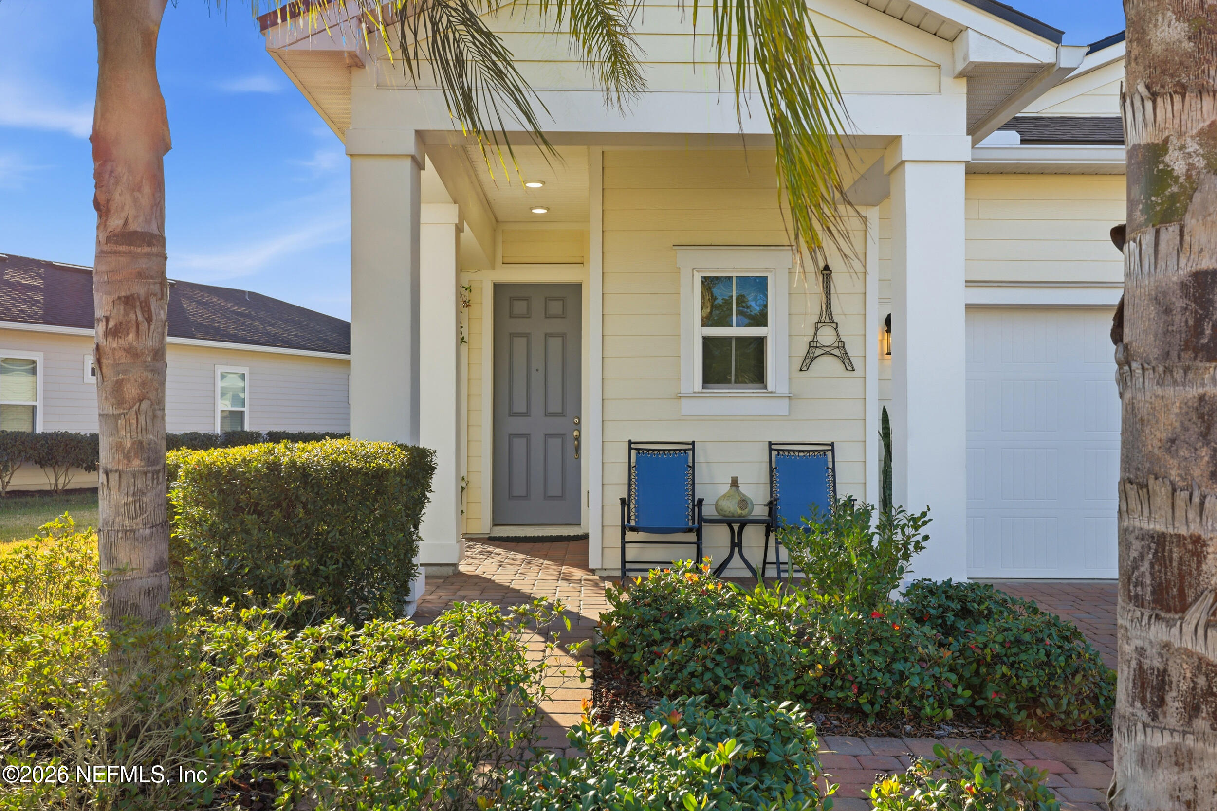 996 Rustic Mill Drive St. Augustine, FL 32092 - Photo 2 of 53 front view of a house with a small yard