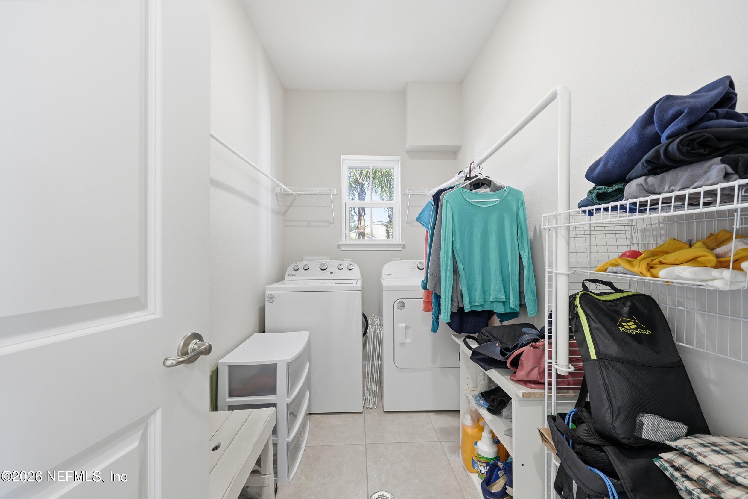 996 Rustic Mill Drive St. Augustine, FL 32092 - Photo 29 of 53 a utility room with dryer and washer