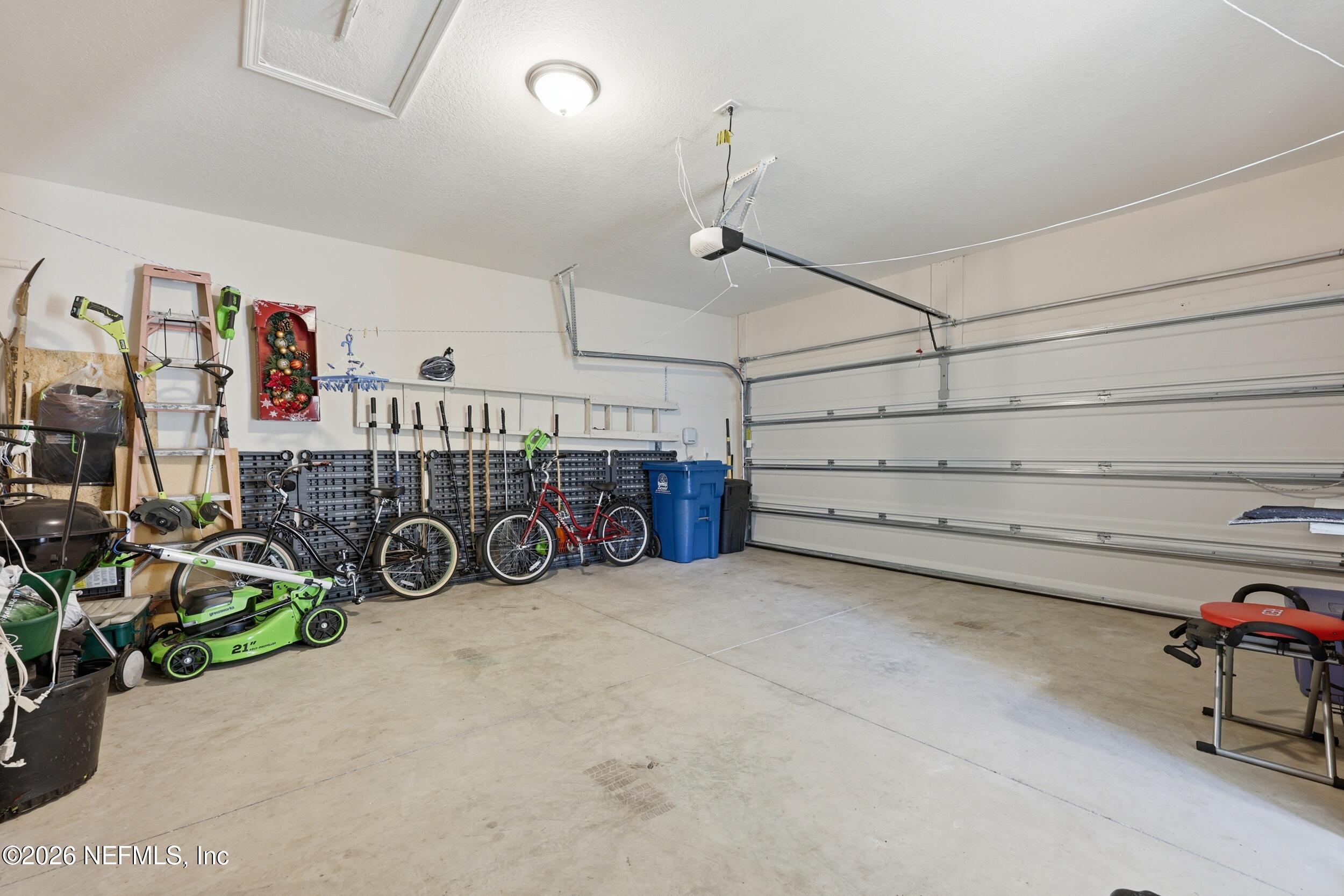 996 Rustic Mill Drive St. Augustine, FL 32092 - Photo 30 of 53 a view of a garage with storage