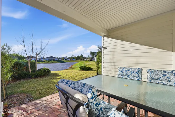 a view of swimming pool from a balcony