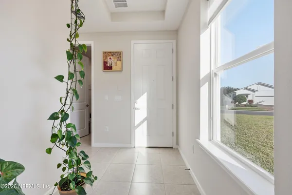 a hallway with beautiful flowers