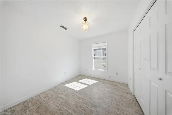 a view of a window in an empty room