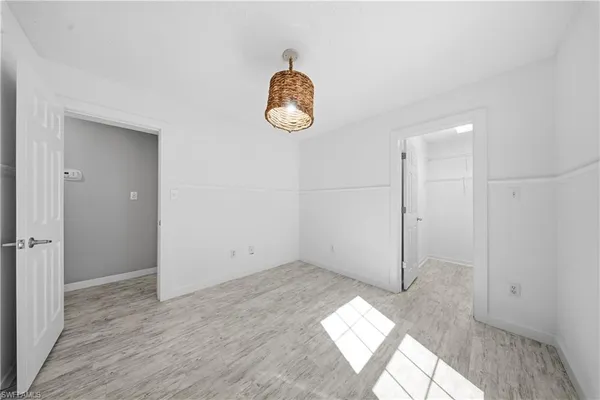 a view of a room with racks on the wall