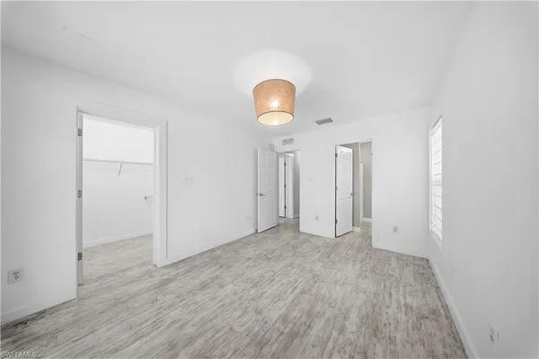 a view of a room with racks on the wall