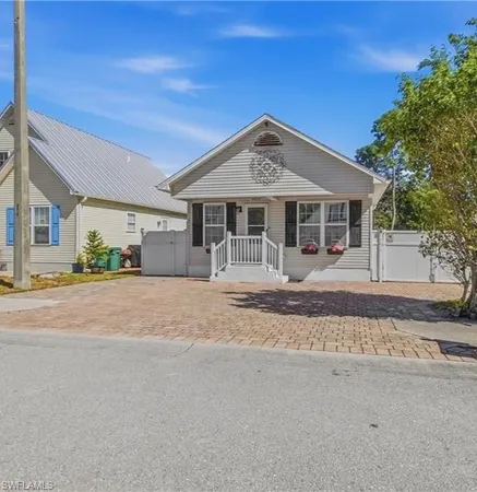 front view of a house with a street