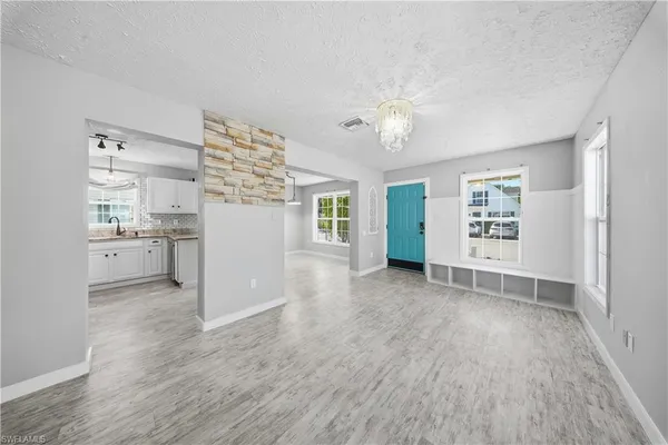 a view of kitchen with wooden floor