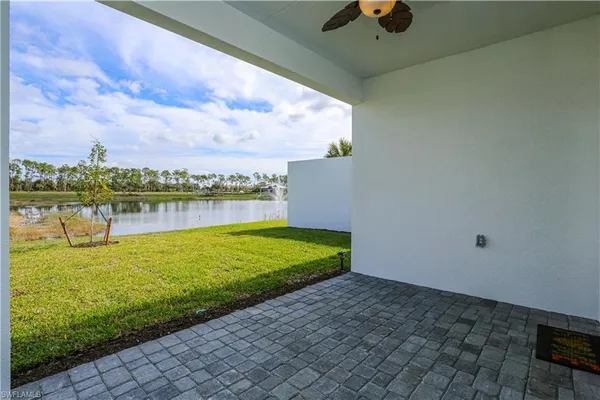 a view of a lake with a big yard