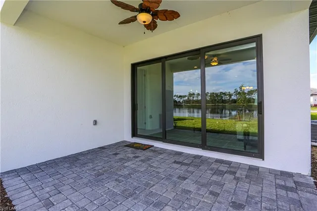 a view of a room with a large window