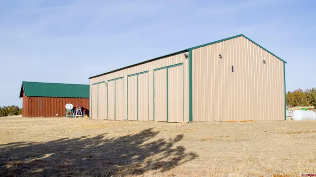 a view of a backyard of the house