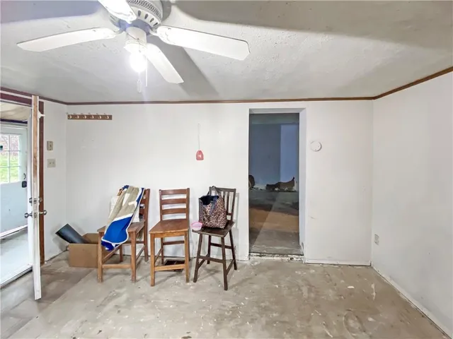 a dining room with furniture and entryway