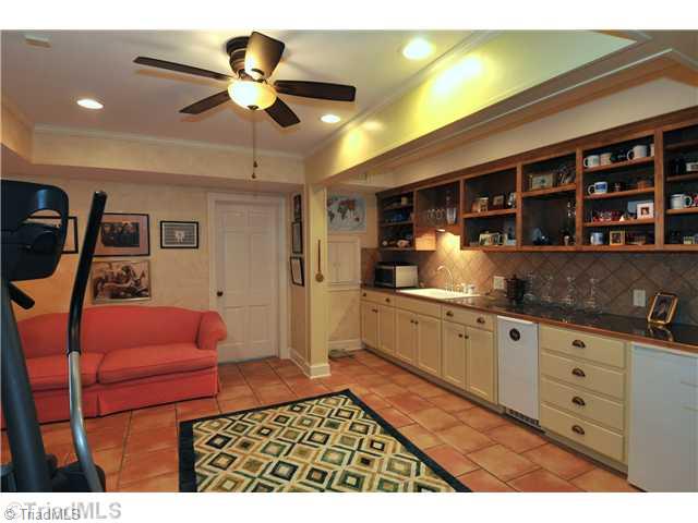 1931 Virginia Road Winston-Salem, NC 27104 - Photo 14 of 16 Playroom. Lower level playroom with mini Kitchen
