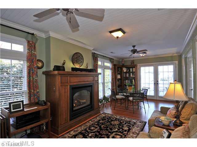 1931 Virginia Road Winston-Salem, NC 27104 - Photo 7 of 16 Sunroom. Library/Sunroom with Heart-of-Pine flooring