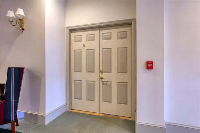 a view of a hallway with workspace