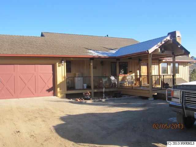 21540 Sazarac Road Reno, NV 89521 - Photo 1 of 1 a view of a house with patio
