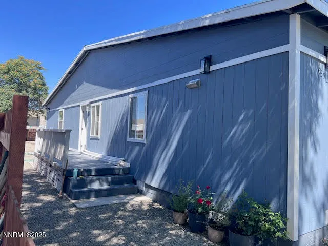 a kitchen with a sink cabinets and a window