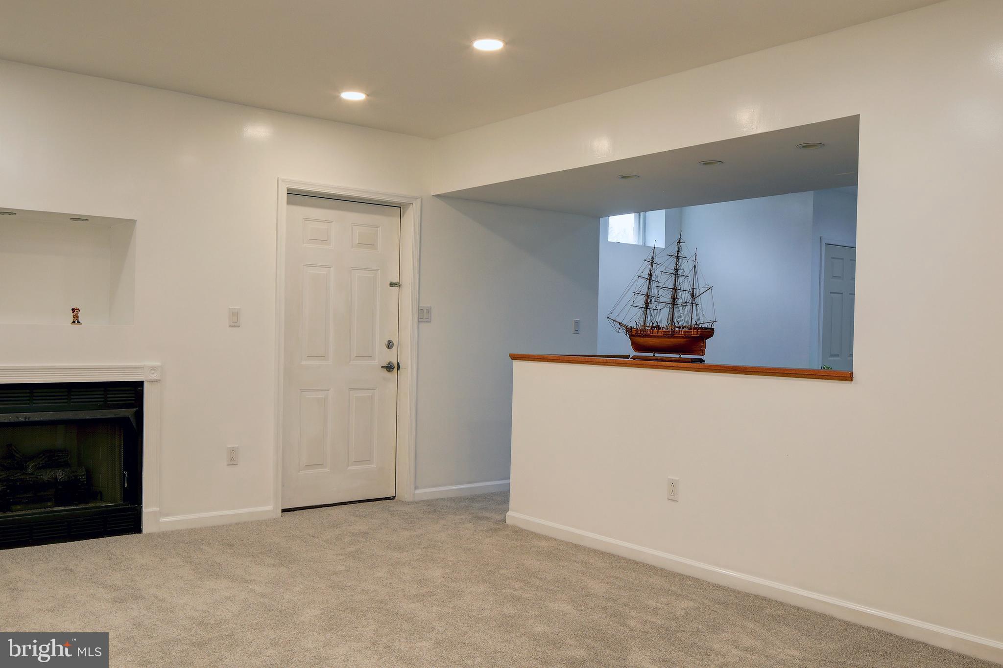 4507 Mt Carmel Road Hampstead, MD 21074 - Photo 26 of 60 Basement Family Room with Propane Gas Fireplace