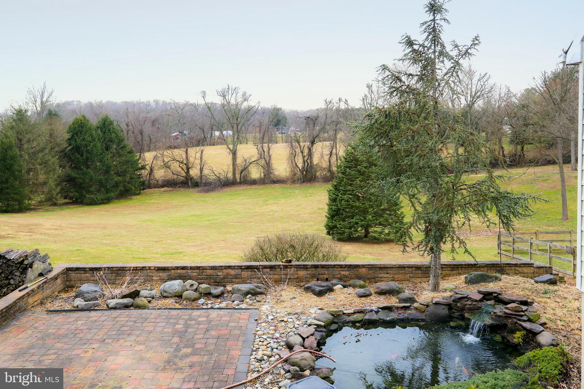 4507 Mt Carmel Road Hampstead, MD 21074 - Photo 48 of 60 Views of Upper Level Patio, Yard and Koi Pond