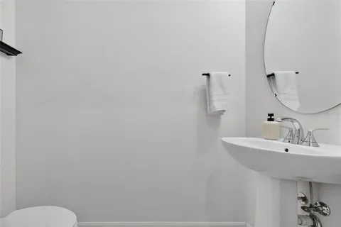 a bathroom with a sink and a toilet
