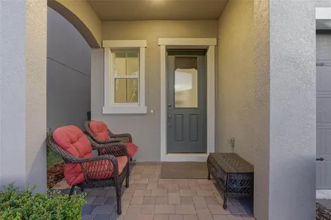a room with furniture and a window