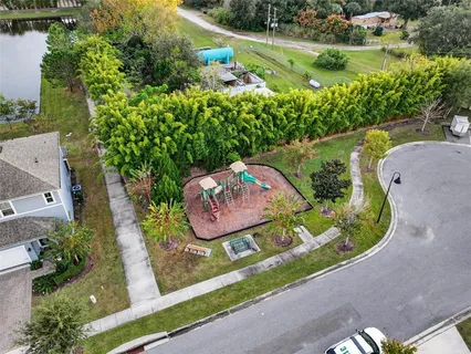 an aerial view of a table and chairs