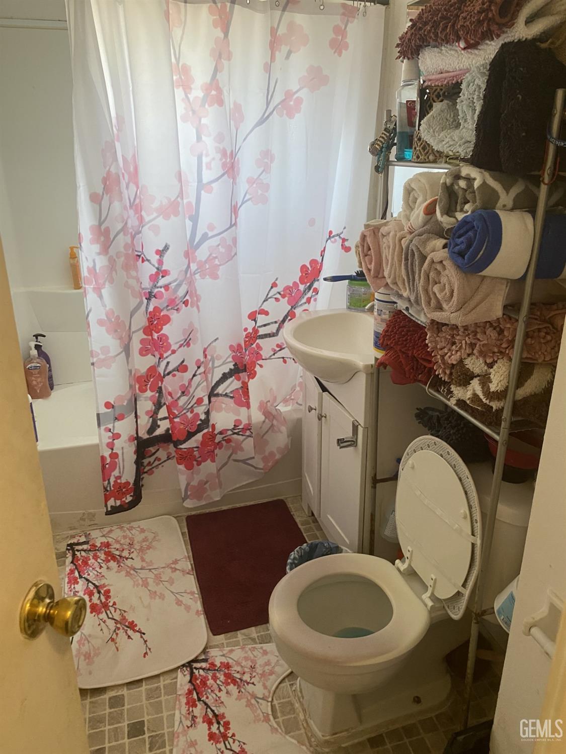 Undisclosed Address Bakersfield, CA 93306 - Photo 11 of 20 a bathroom with a sink toilet and mirror