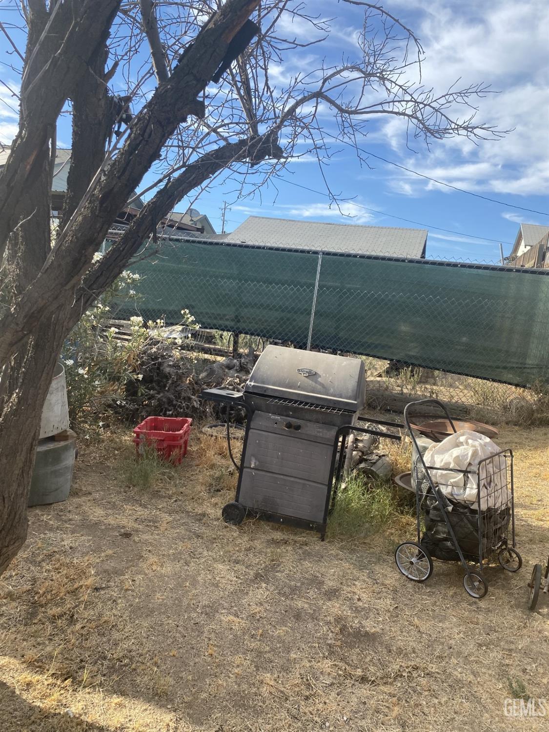 Undisclosed Address Bakersfield, CA 93306 - Photo 18 of 20 a view of a backyard with sitting area