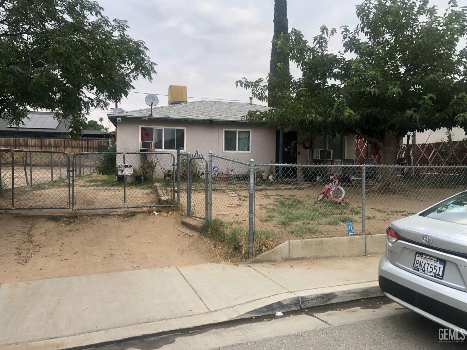 Undisclosed Address Bakersfield, CA 93306 - Photo 2 of 20 a view of a house with backyard