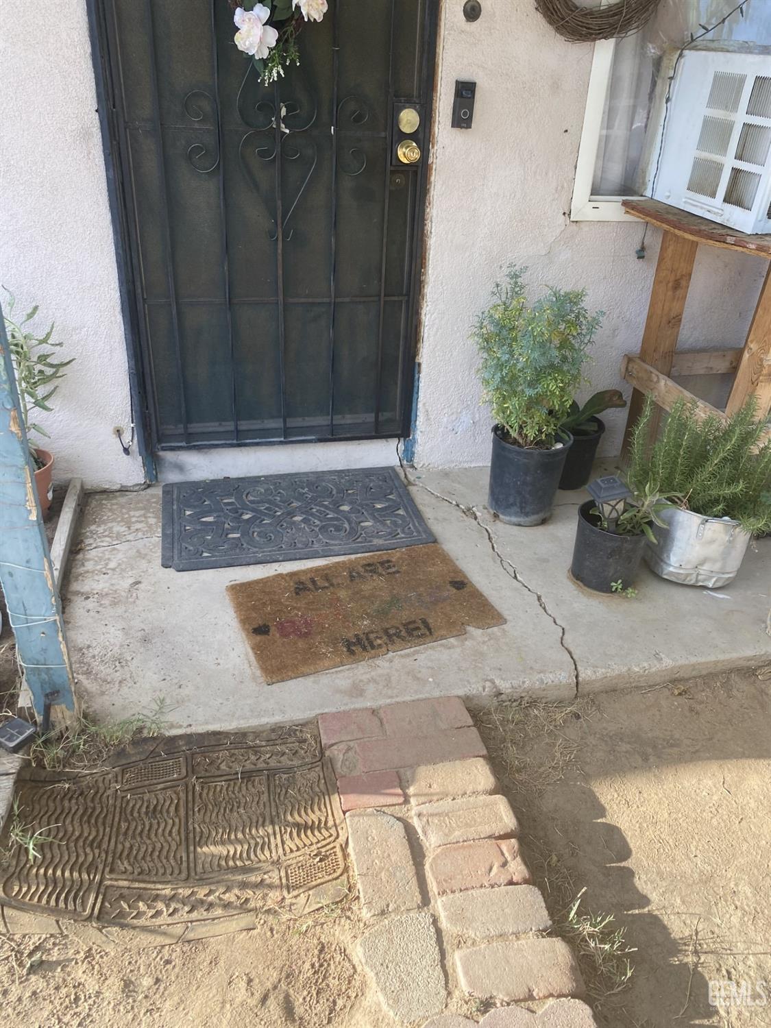 Undisclosed Address Bakersfield, CA 93306 - Photo 3 of 20 a view of a entryway door front of house