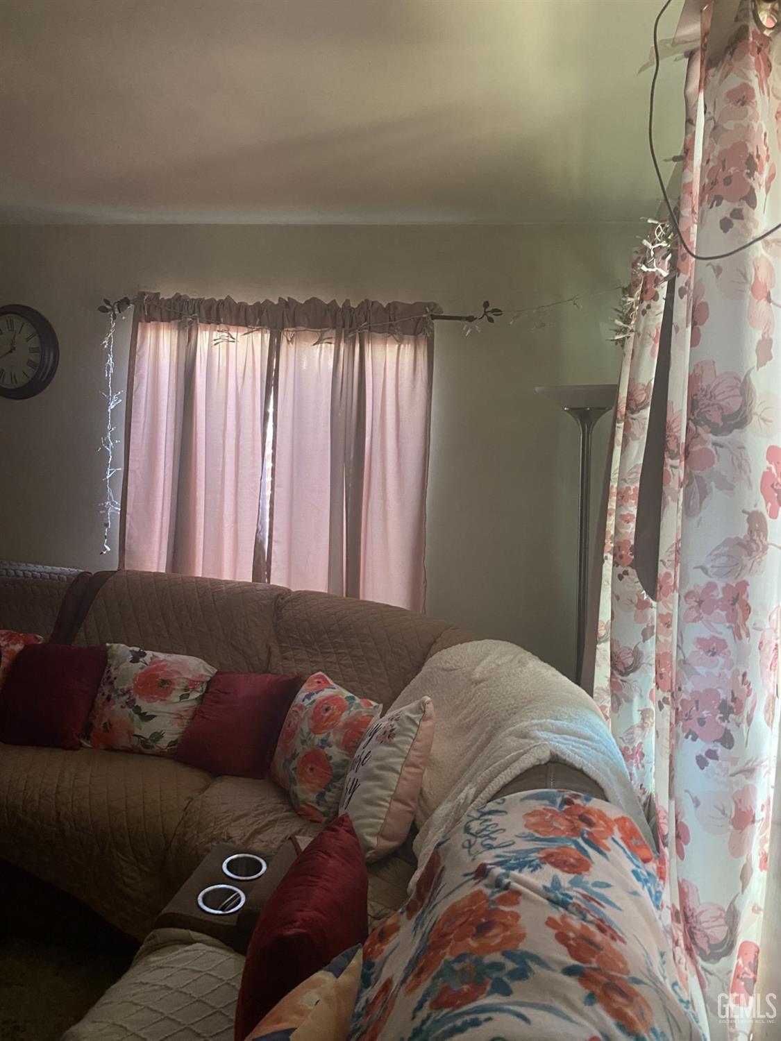 Undisclosed Address Bakersfield, CA 93306 - Photo 4 of 20 a bed sitting in a bedroom next to a window