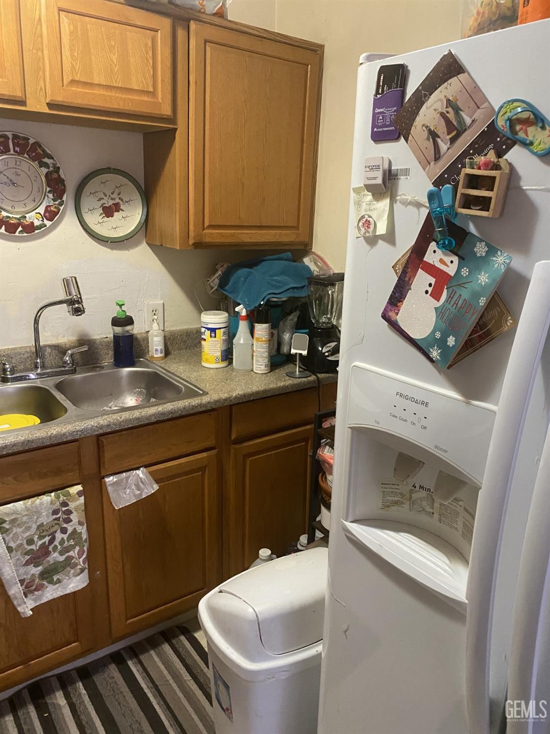 Undisclosed Address Bakersfield, CA 93306 - Photo 7 of 20 a kitchen with a sink appliances and cabinets