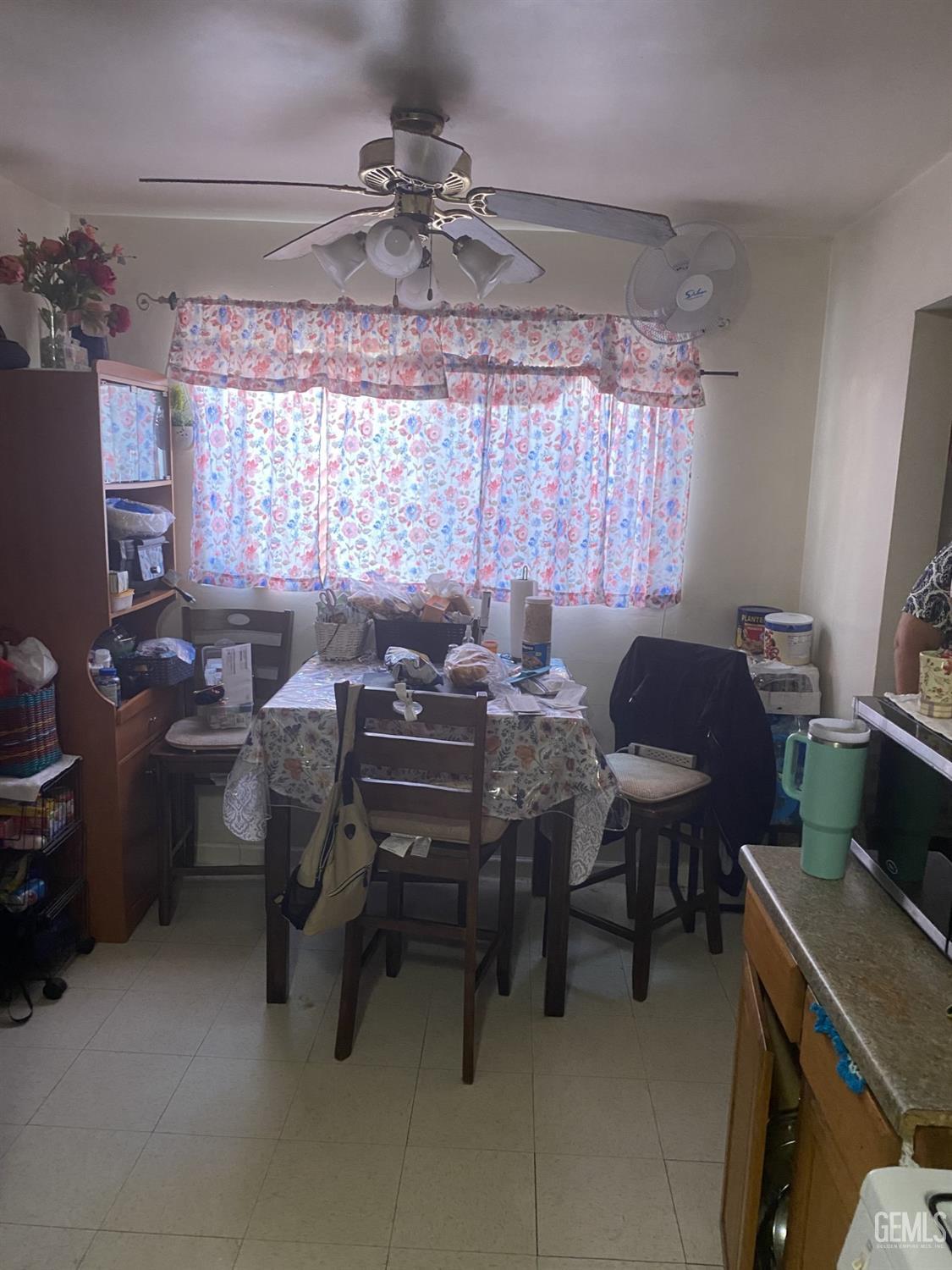 Undisclosed Address Bakersfield, CA 93306 - Photo 8 of 20 a view of a workspace with furniture and a window