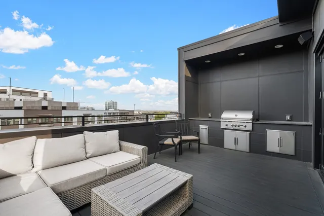 a stove top oven sitting inside of a kitchen