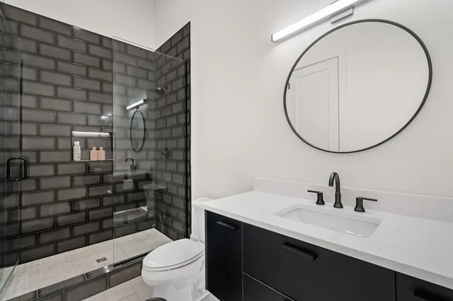 a view of a room with rack on the wall and a window