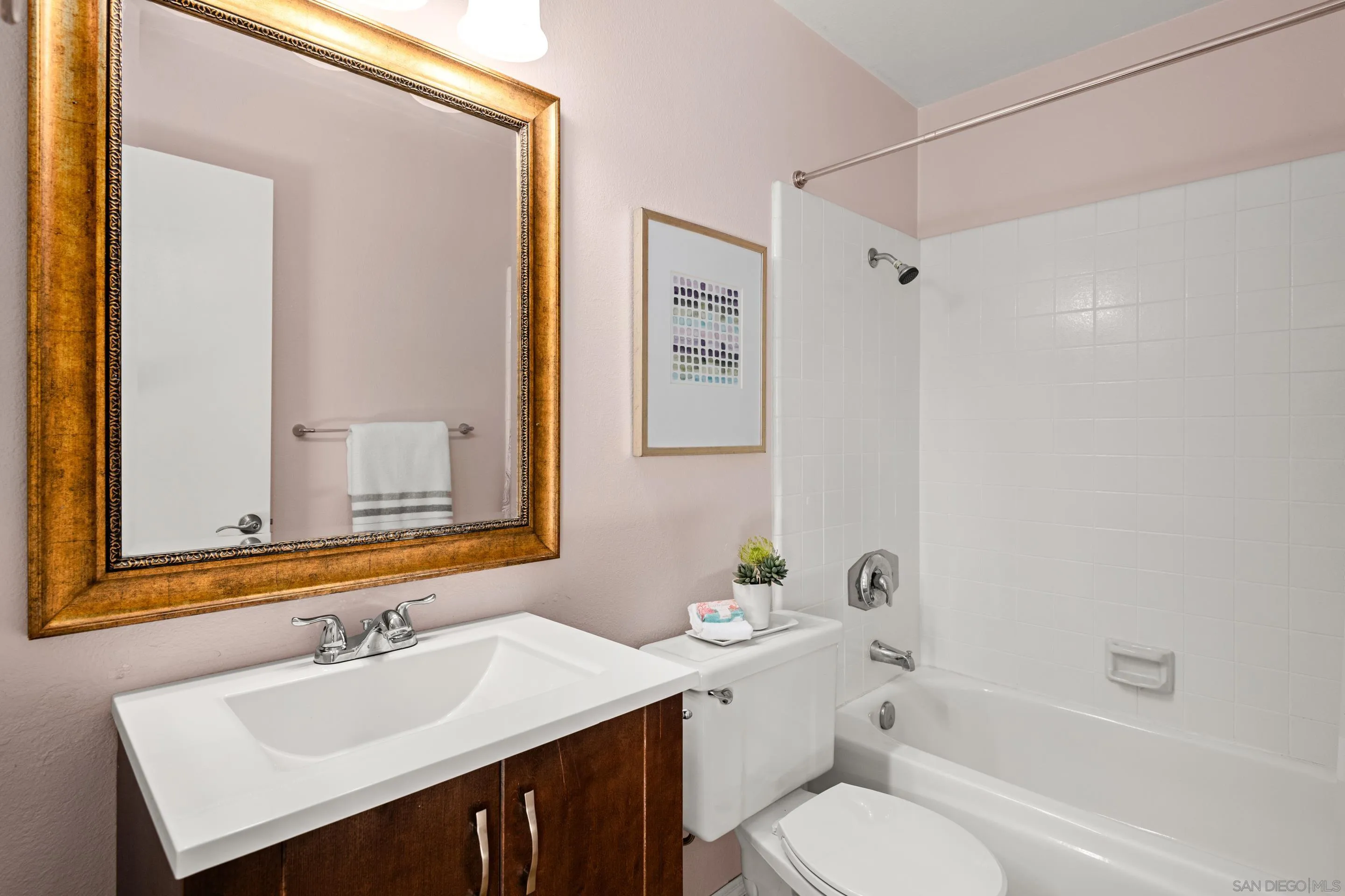 2002 Leafwood Place Encinitas, CA 92024 - Photo 29 of 64 a bathroom with a sink toilet tub and shower